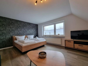 Kompassrose Wohnungen Ferienwohnung Sonnendeck